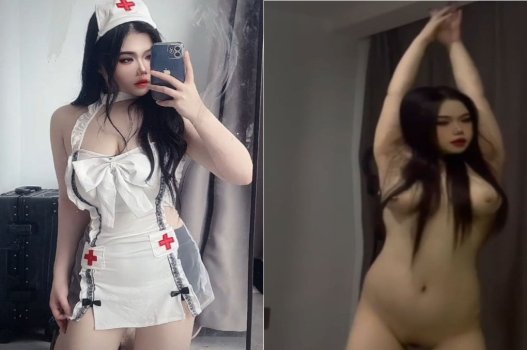 Y tá ngực lớn chăm sóc bệnh nhân